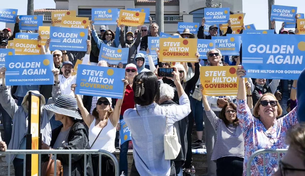 Supporters cheer for Steve Hilton as he announced his run for California governor, as a Republican to replace Democrat Gavin Newsom, during an event in Huntington Beach, Calif., Tuesday, April 22, 2025. (Paul Bersebach/The Orange County Register via AP)