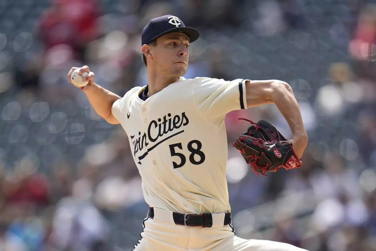 Minnesota Twins starting pitcher David Festa (58) delivers during the first inning of a baseball game against the New York Mets, Wednesday, April 16, 2025, in Minneapolis. (AP Photo/Abbie Parr)