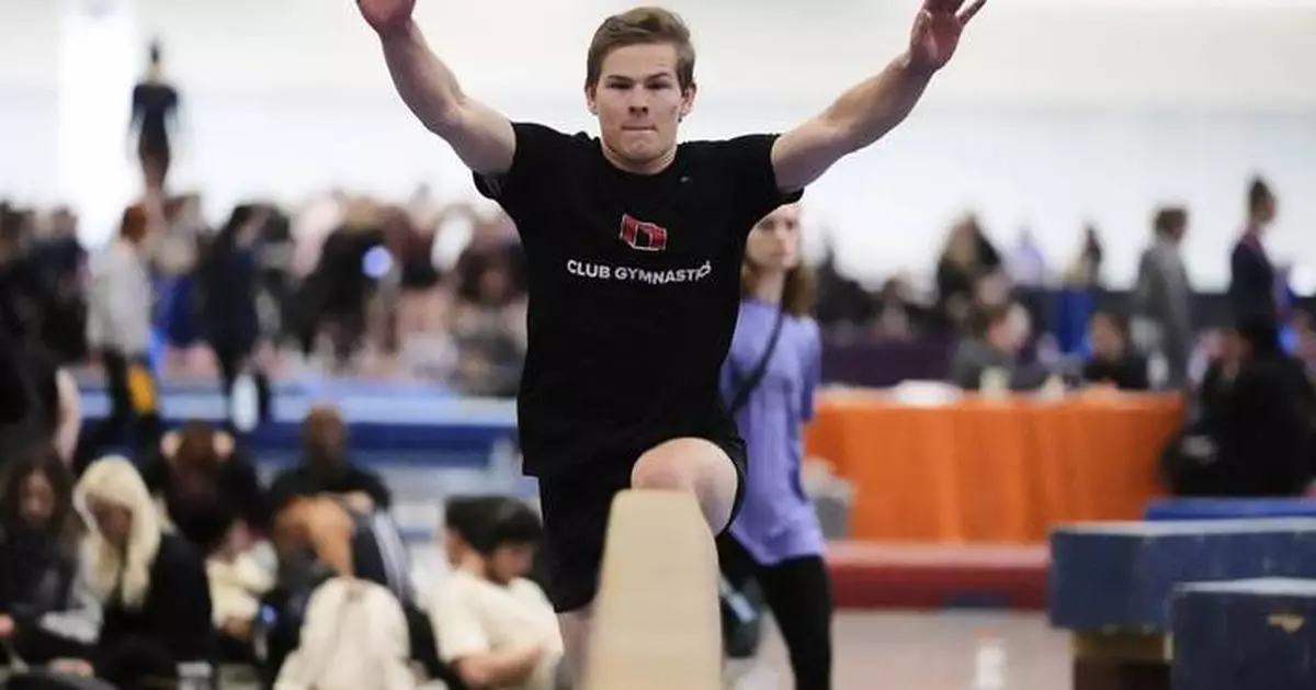 'Why can't I do that?' Men on balance beam. Women on rings. In one gymnastics group, anything goes