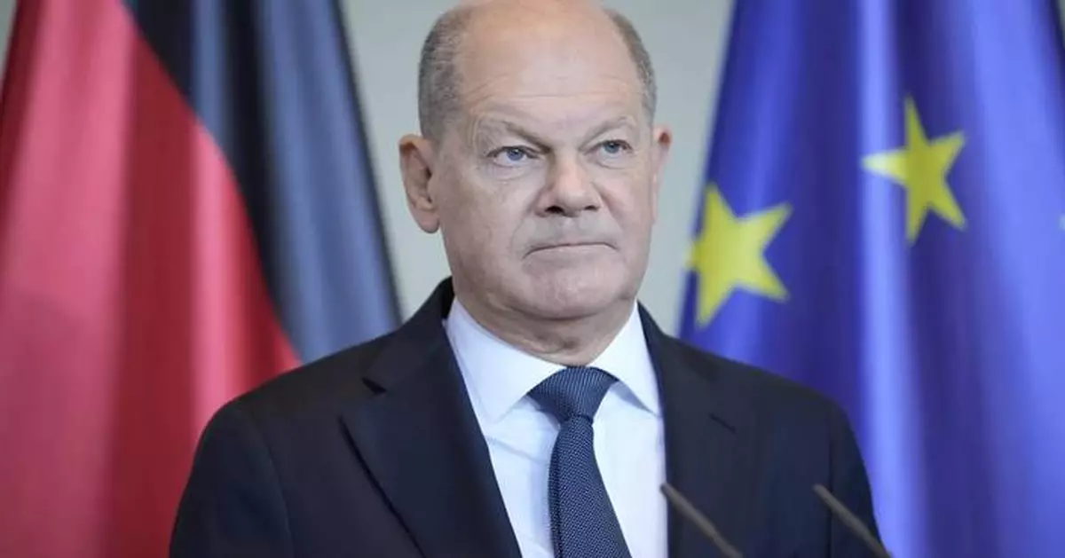 A man slipped into a VIP convoy and hugged the German chancellor in 2023. Now he has to pay a fine