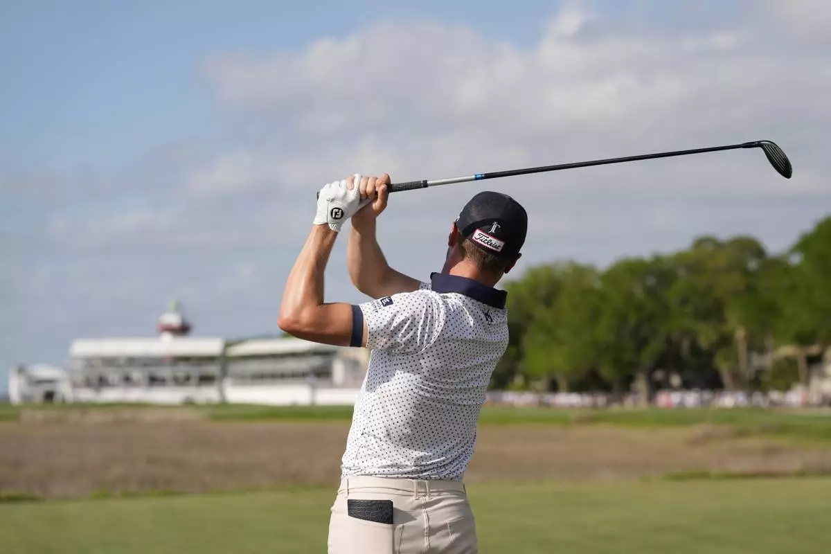 Justin Thomas hits from the 18th tee during the second round of the RBC Heritage golf tournament, Friday, April 18, 2025, in Hilton Head Island, S.C. (AP Photo/Mike Stewart)
