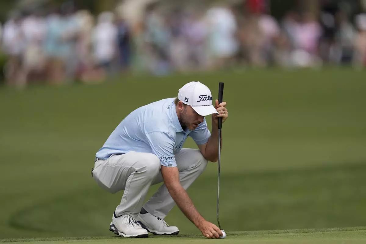 Russell Henley lines up a putt on the 16th green during the second round of the RBC Heritage golf tournament, Friday, April 18, 2025, in Hilton Head Island, S.C. (AP Photo/Mike Stewart)