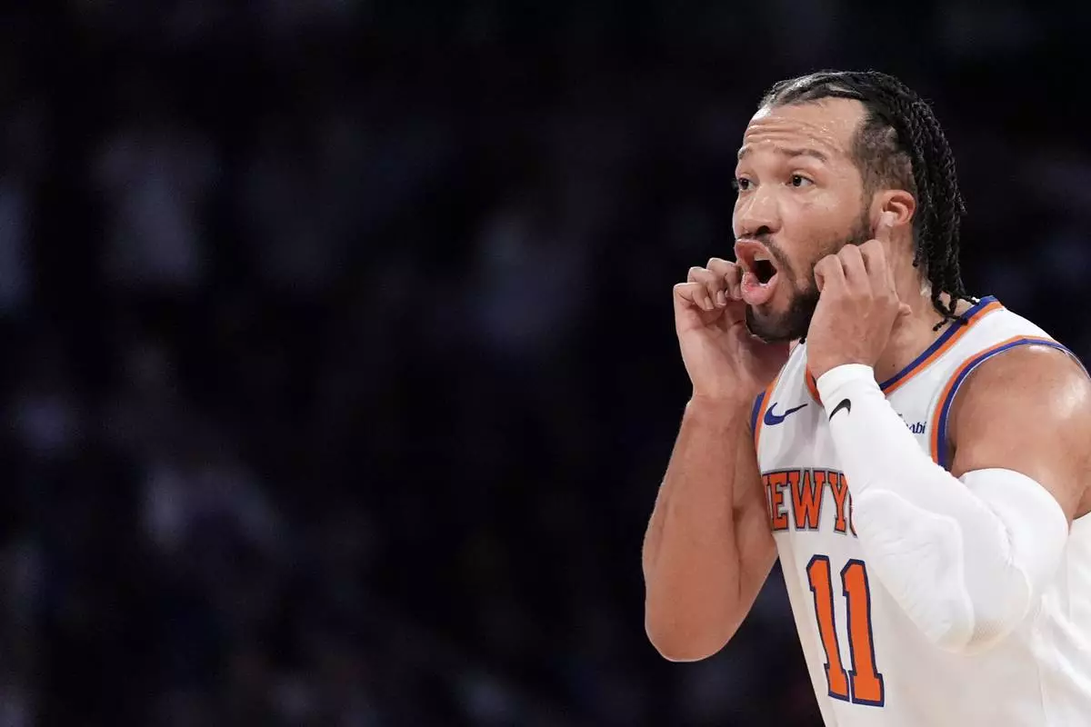 New York Knicks guard Jalen Brunson reacts during the second half of Game 1 in an NBA basketball first-round playoff series against the Detroit Pistons, Saturday, April 19, 2025, in New York. (AP Photo/Julia Demaree Nikhinson)