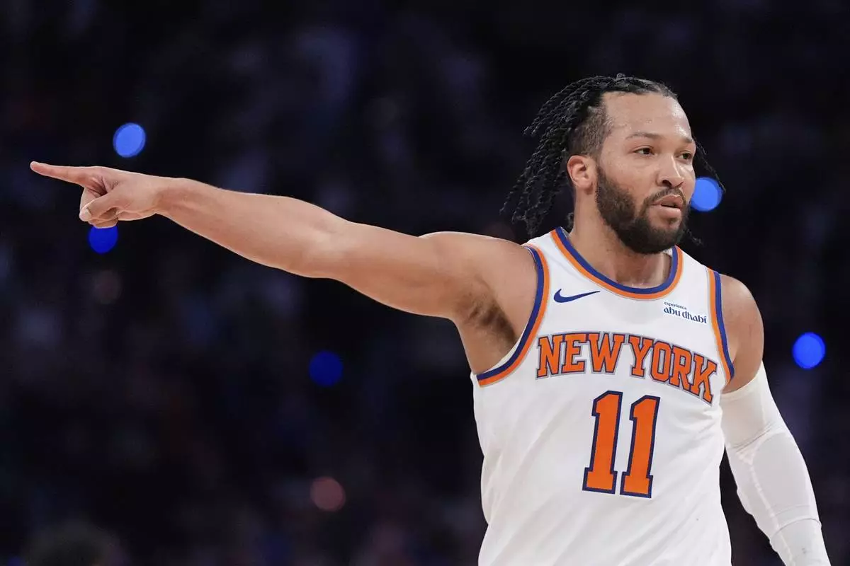 New York Knicks guard Jalen Brunson reacts during the second half of Game 1 in an NBA basketball first-round playoff series against the Detroit Pistons, Saturday, April 19, 2025, in New York. (AP Photo/Julia Demaree Nikhinson)