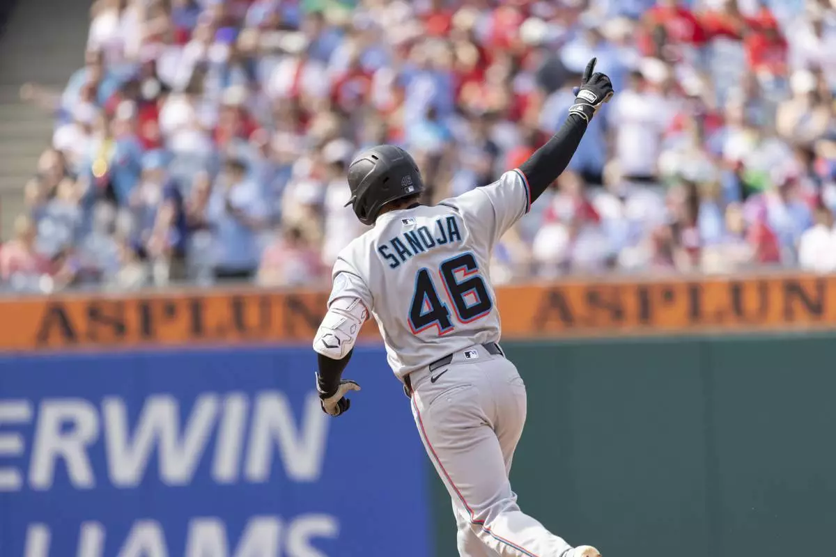 Miami Marlins' Javier Sanoja rounds the bases after hitting a three run home run in the eighth inning of a baseball game against the Philadelphia Phillies, Sunday, April 20, 2025, in Philadelphia. (AP Photo/Laurence Kesterson)