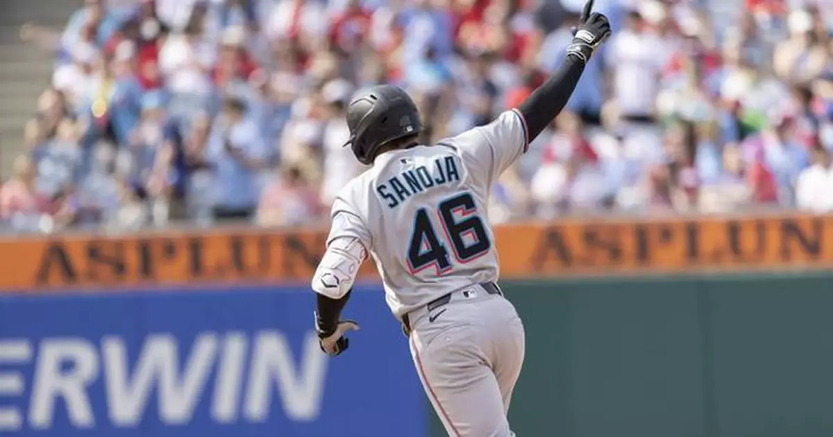 Sanoja has 5 RBIs as Marlins rally to beat Phillies 7-5 in 10 innings