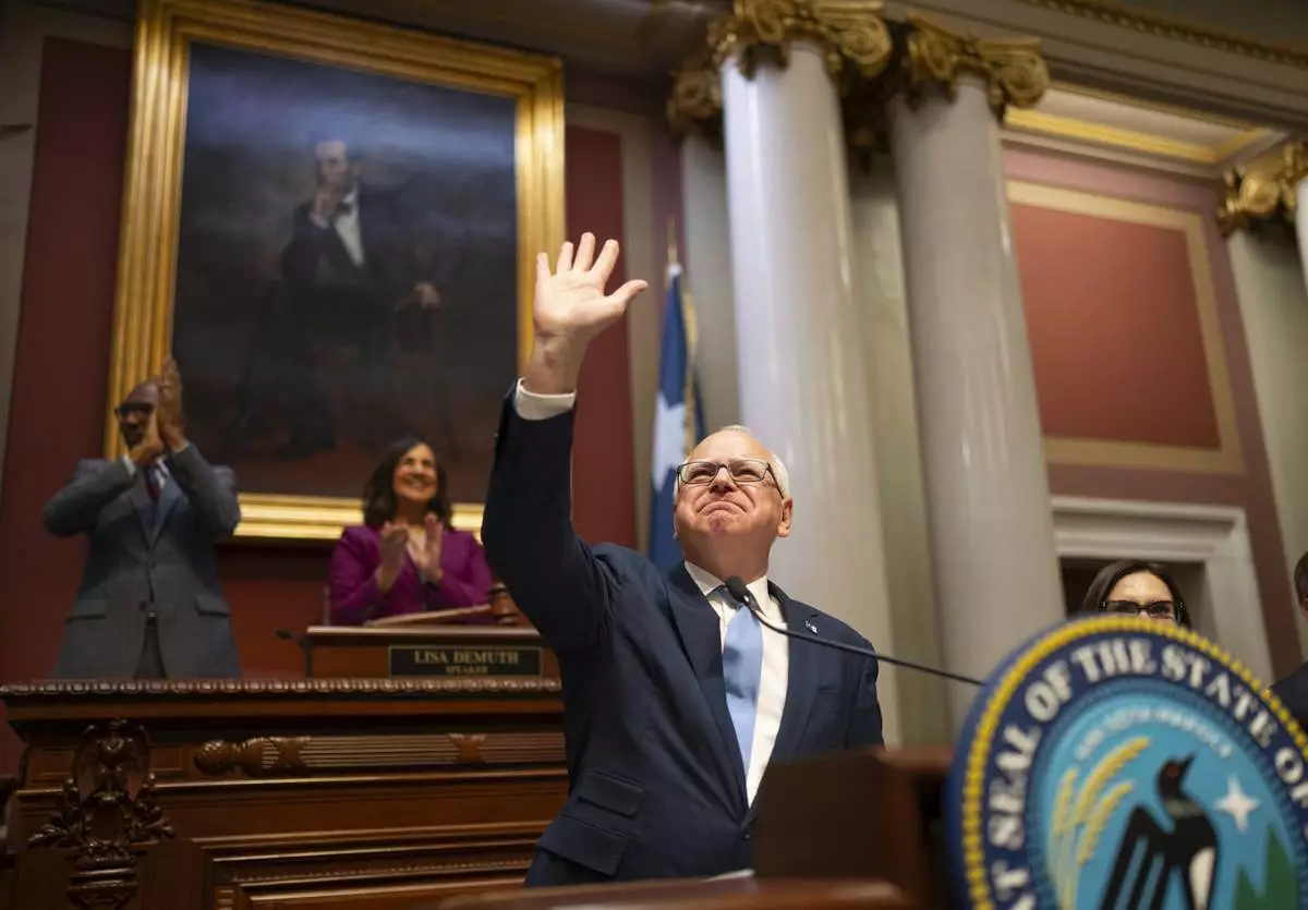 Minnesota Gov. Tim Walz acknowledges the applause of the House chamber before he delivers his State of the State address before a joint session of the Legislature at the state Capitol in St. Paul, Minn., Wednesday, April 23, 2025. (Jeff Wheeler/Star Tribune via AP)