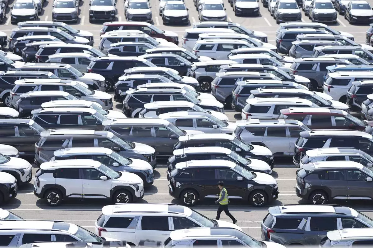 Vehicles for export are parked at a port in Pyeongtaek, South Korea, Tuesday, April 15, 2025. (AP Photo/Lee Jin-man)