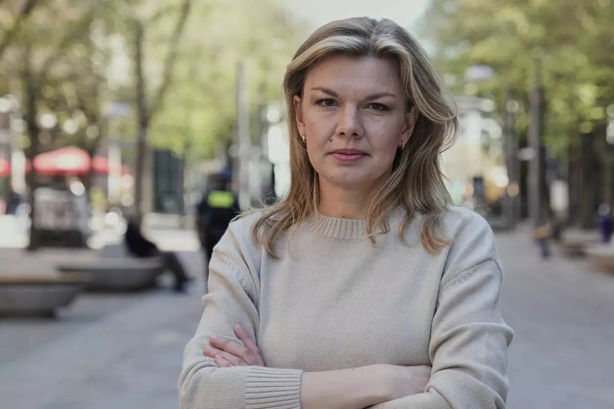 Ksenia Lutskina, a Belarusian journalist who was imprisoned in Belarus for several years and left the country after her release, poses for a photo in Berlin, Germany, on April 15, 2025. (AP Photo/Ebrahim Noroozi)