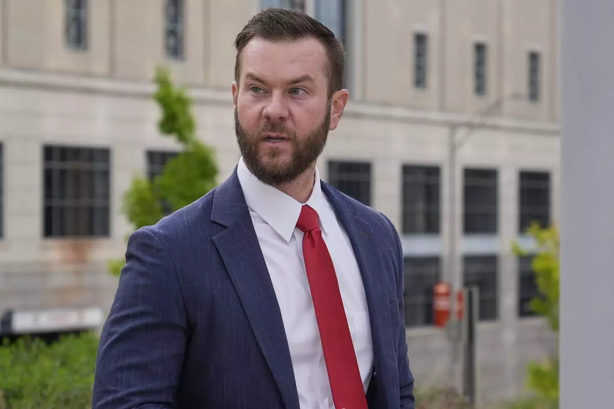 Cade Cothren, the former chief of staff to former Tennessee House Speaker Glen Casada, arrives at the federal courthouse Tuesday, April 22, 2025, in Nashville, Tenn. (AP Photo/George Walker IV)