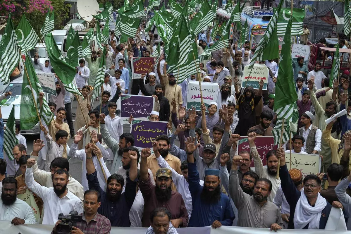 Supporters of the Pakistan Murkazi Muslim League party chant slogans during a demonstration against the suspension of water-sharing treaty by India with Pakistan, in Lahore, Pakistan Thursday, April 24, 2025.(AP Photo/K.M. Chaudary)