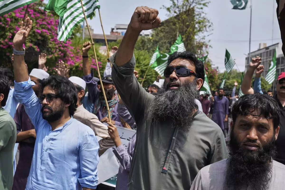 Supporters of the Pakistan Murkazi Muslim League party chant slogans during a demonstration against the suspension of water-sharing treaty by India with Pakistan, in Lahore, Pakistan Thursday, April 24, 2025.(AP Photo/K.M. Chaudary)