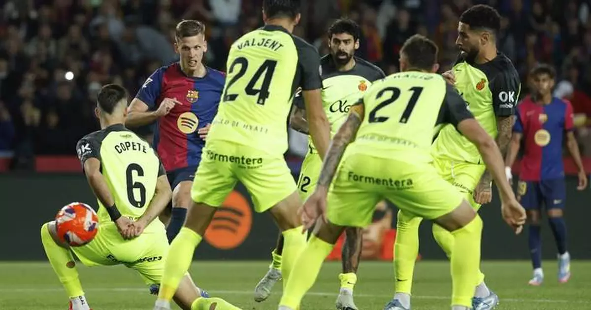 Barcelona increases Spanish league lead by beating Mallorca 1-0 on Dani Olmo's goal