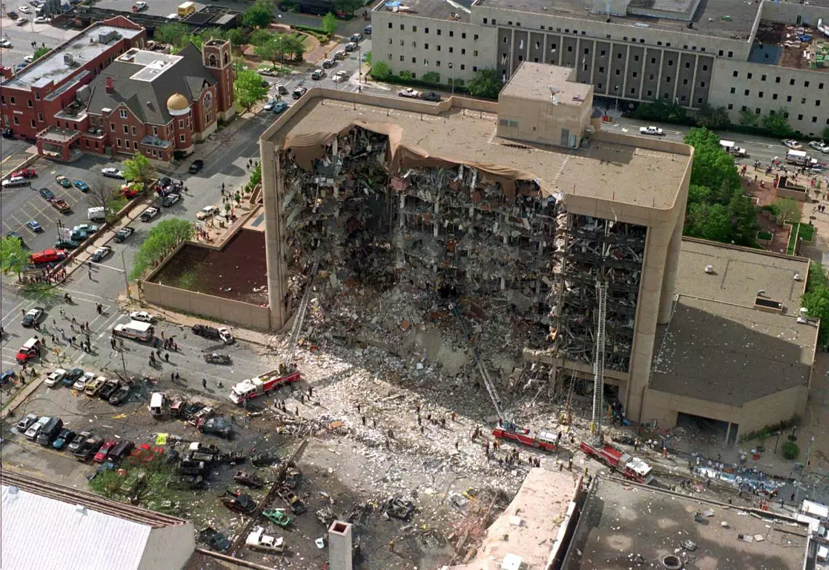 FILE - This aerial view shows the destroyed north side of the Alfred P. Murrah Federal Building in Oklahoma City after a massive bomb blast, April 19, 1995. (AP Photo, File)