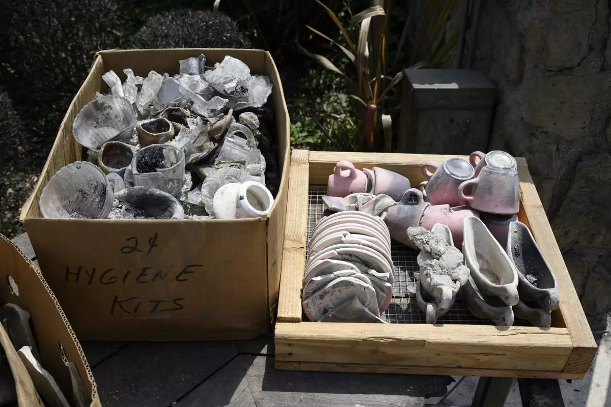 Debris recovered from the Community United Methodist Church of the Pacific Palisades, Friday, April 18, 2025, in the Pacific Palisades area of Los Angeles. (AP Photo/William Liang)