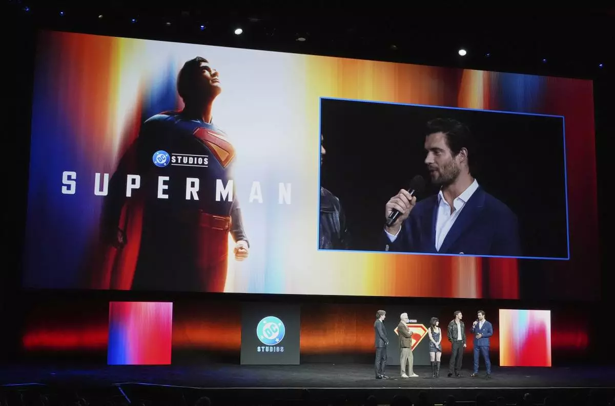 David Corenswet, star of the upcoming film "Superman," is pictured on a video screen discussing the role alongside fellow cast members and filmmakers during the Warner Bros. Pictures presentation at CinemaCon on Tuesday, April 1, 2025, at Caesars Palace in Las Vegas. (AP Photo/Chris Pizzello)