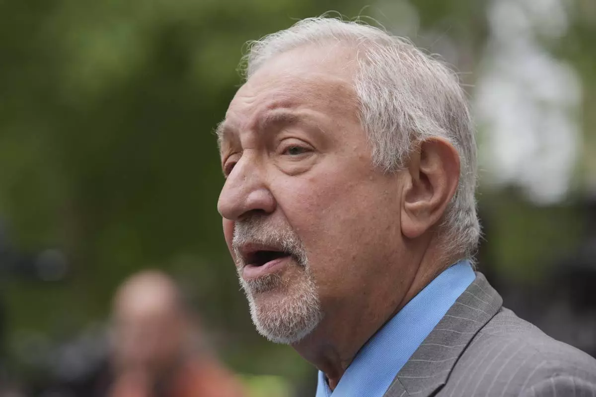 Attorney Mark Geragos, representing Erik and Lyle Menendez, who were sentenced in 1996 to life in prison without the possibility of parole for fatally shooting their parents, speaks to the media outside of court after a resentencing hearing in their case, Thursday, April 17, 2025, in Los Angeles. (AP Photo/Damian Dovarganes)