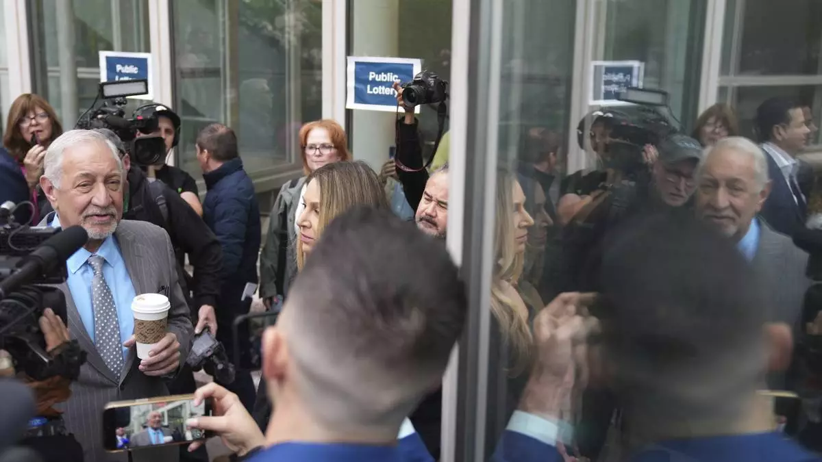 Attorney Mark Geragos, representing Erik and Lyle Menendez, arrives for a hearing in their case Thursday, April 17, 2025, in Los Angeles. (AP Photo/Damian Dovarganes)