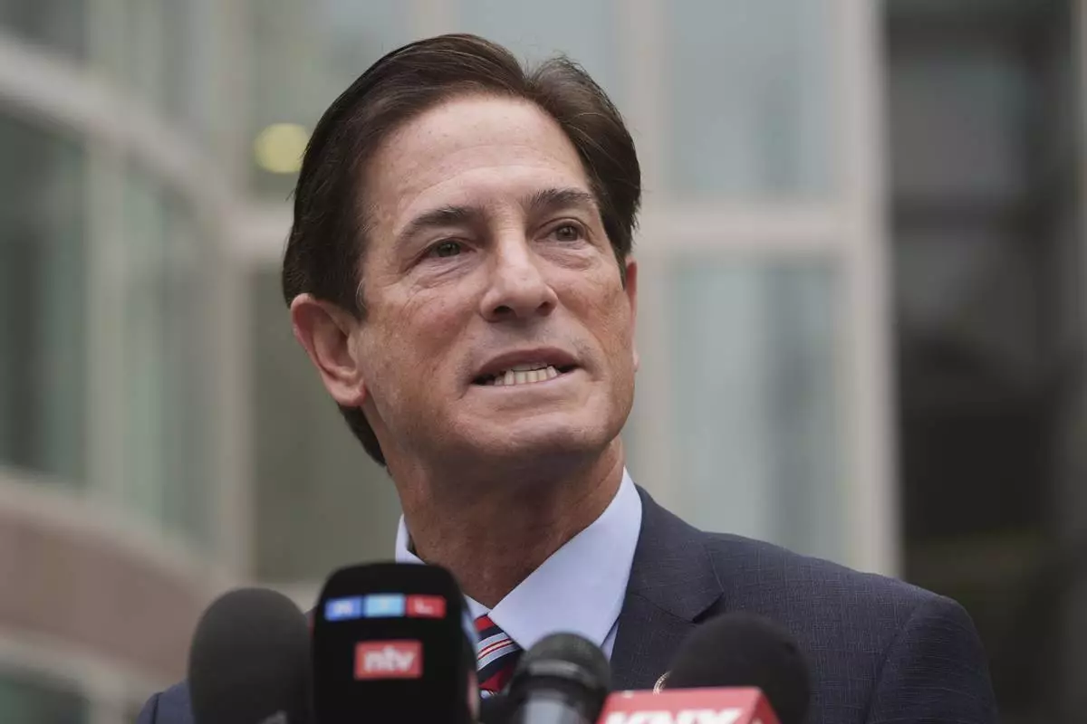 Los Angeles County District Attorney Nathan Hochman speaks outside of the courthouse during a hearing in the case of Erik and Lyle Menendez Thursday, April 17, 2025, in Los Angeles. (AP Photo/Damian Dovarganes)