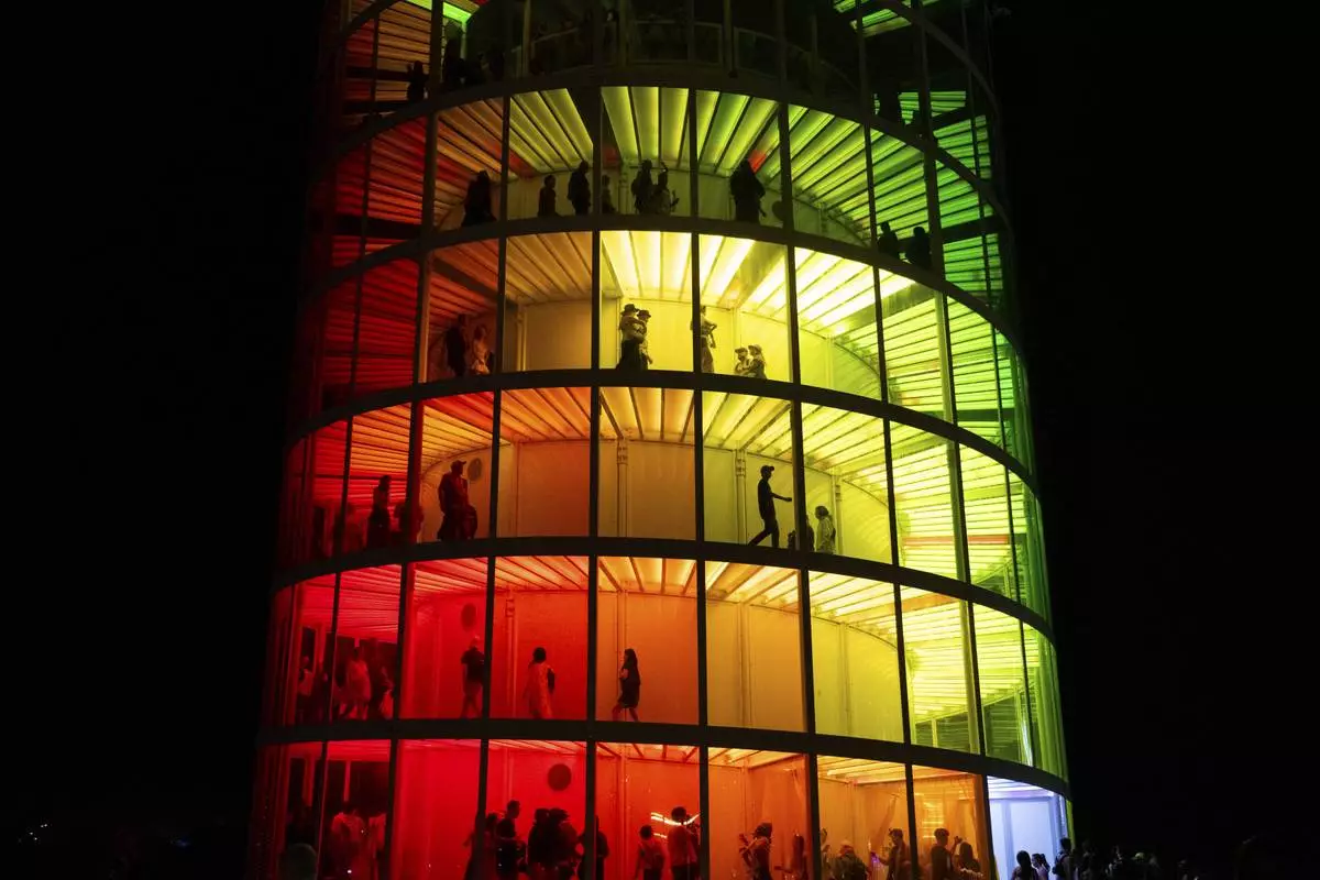 Festivalgoers are seen during the first weekend of the Coachella Valley Music and Arts Festival at the Empire Polo Club on Friday, April 11, 2025, in Indio, Calif. (Photo by Amy Harris/Invision/AP)