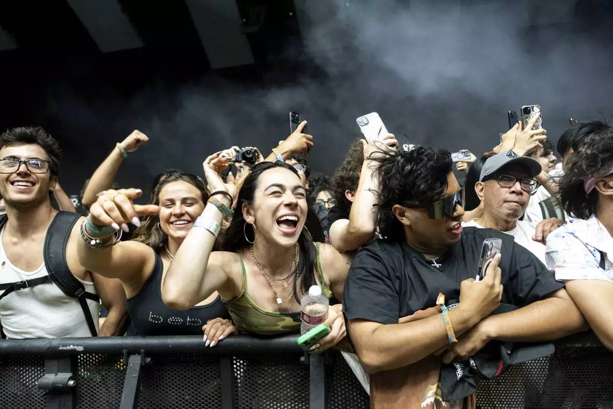 Festivalgoers are seen during the first weekend of the Coachella Valley Music and Arts Festival at the Empire Polo Club on Friday, April 11, 2025, in Indio, Calif. (Photo by Amy Harris/Invision/AP)
