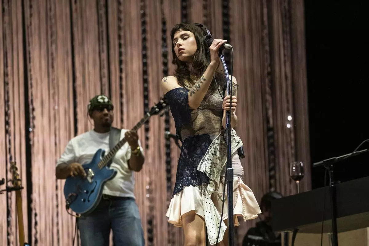 Clairo performs during the first weekend of the Coachella Valley Music and Arts Festival at the Empire Polo Club on Saturday, April 12, 2025, in Indio, Calif. (Photo by Amy Harris/Invision/AP)