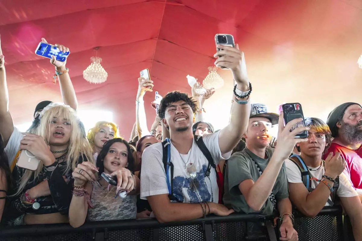 Festivalgoers are seen during the first weekend of the Coachella Valley Music and Arts Festival at the Empire Polo Club on Saturday, April 12, 2025, in Indio, Calif. (Photo by Amy Harris/Invision/AP)