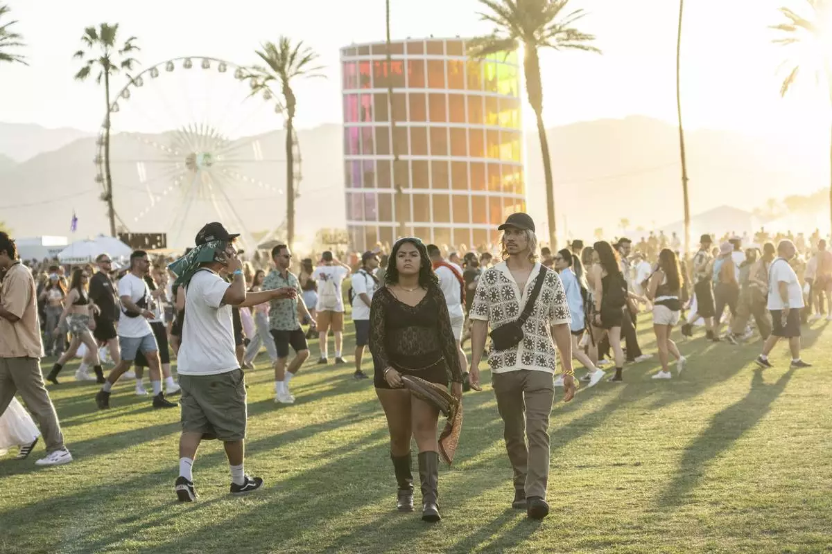Festivalgoers are seen during the first weekend of the Coachella Valley Music and Arts Festival at the Empire Polo Club on Saturday, April 12, 2025, in Indio, Calif. (Photo by Amy Harris/Invision/AP)