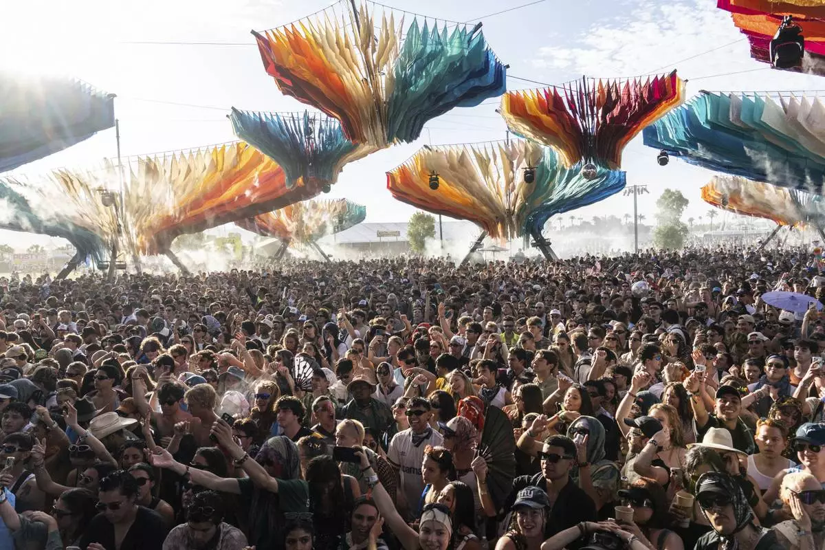 Festivalgoers are seen during the first weekend of the Coachella Valley Music and Arts Festival at the Empire Polo Club on Saturday, April 12, 2025, in Indio, Calif. (Photo by Amy Harris/Invision/AP)