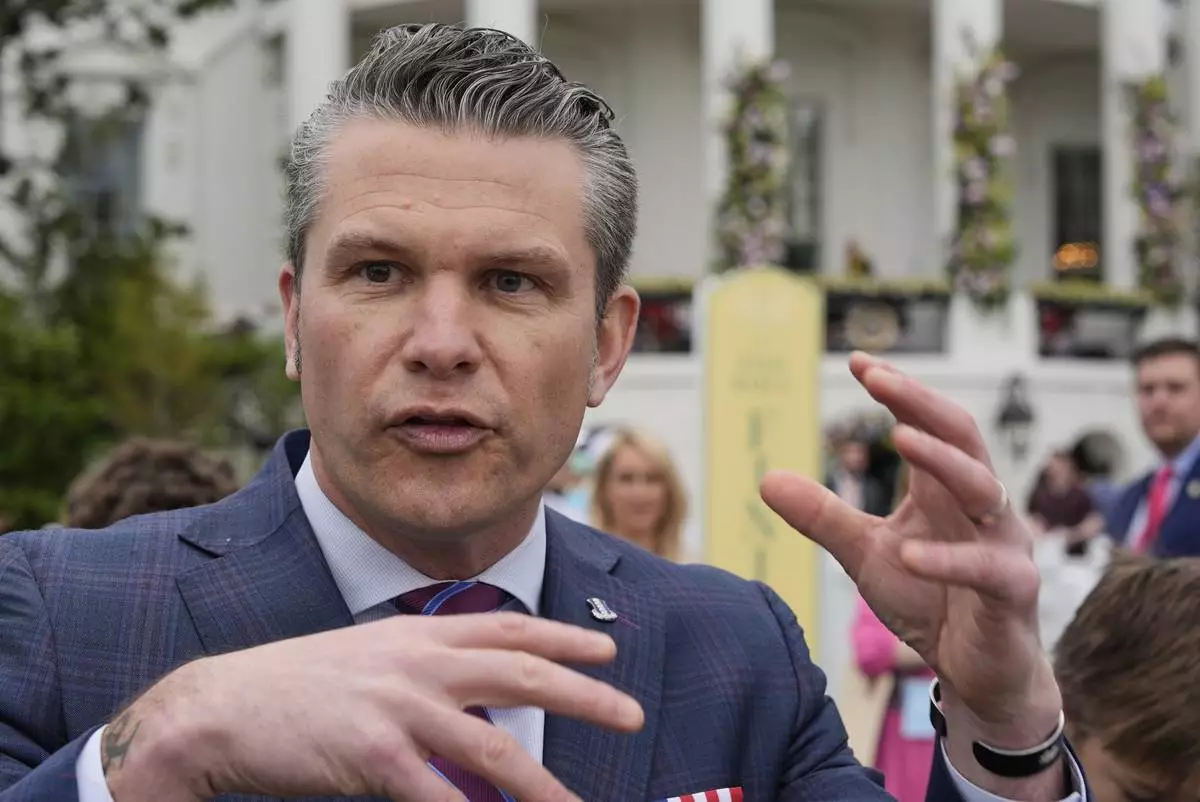 Defense Secretary Pete Hegseth speaks on the South Lawn of the White House before President Donald Trump and first lady Melania Trump participate in the White House Easter Egg Roll Monday, April 21, 2025, in Washington. (AP Photo/Alex Brandon)