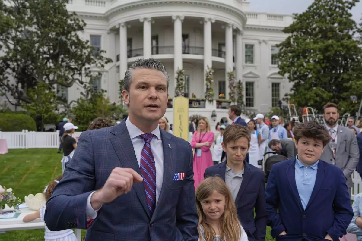 Defense Secretary Pete Hegseth speaks on the South Lawn of the White House before President Donald Trump and first lady Melania Trump participate in the White House Easter Egg Roll Monday, April 21, 2025, in Washington. (AP Photo/Alex Brandon)