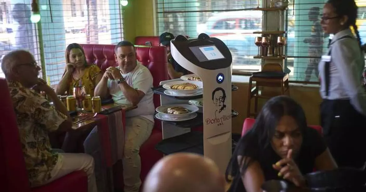 A restaurant in Havana defies Cuba's tech struggles with digital menus and a robot waitress