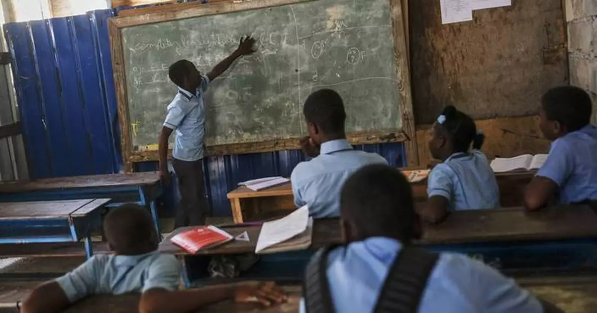 France's president says that making Haiti pay for its independence was unjust