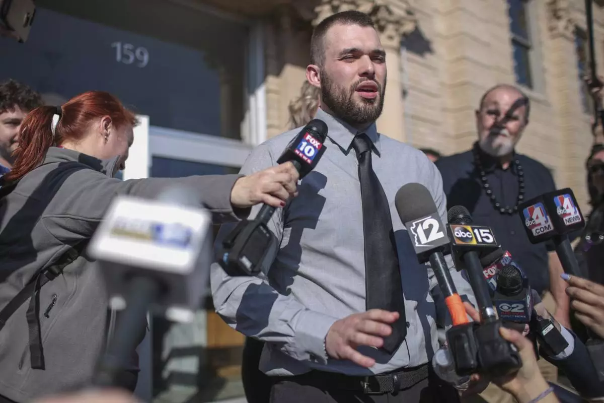 FILE - Lori Vallow Daybell's son Colby Ryan addresses the media during the hearing for Daybell on Friday, March 6, 2020, in Rexburg, Idaho. Daybell who is charged with felony child abandonment after her two children went missing nearly six months ago had her bond reduced to $1 million by an Idaho judge on Friday. (John Roark/The Idaho Post-Register via AP, Pool, File)