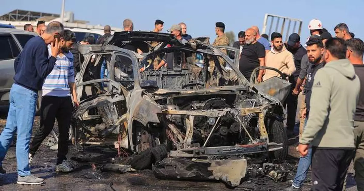 Hezbollah says it won't hand over weapons while Israeli troops remain in southern Lebanon