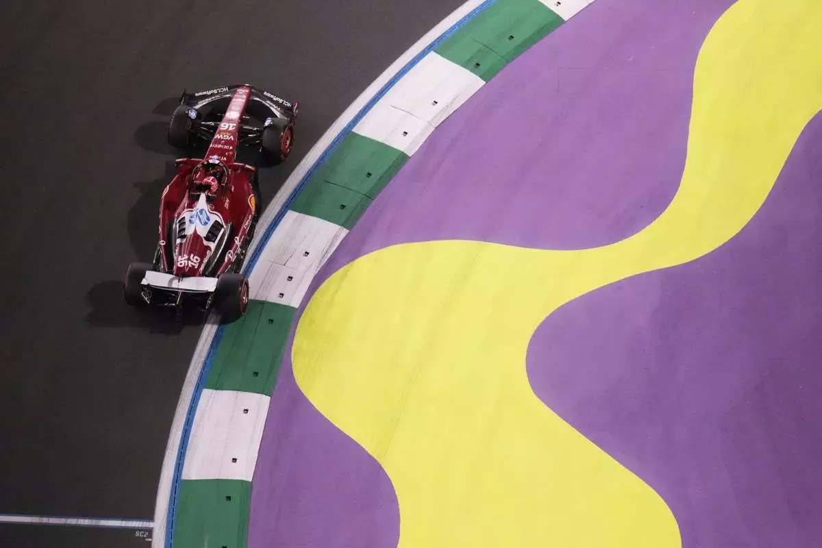 Ferrari driver Charles Leclerc of Monaco steers his car during the second free practice ahead of the Formula One Saudi Arabian Grand Prix at the Jeddah Corniche Circuit in Jeddah, Saudi Arabia, Friday, April 18, 2025. (AP Photo/Darko Bandic)