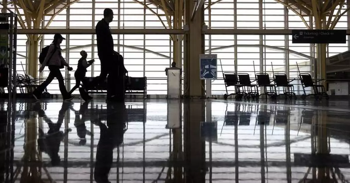 The wing tip of an American Airlines plane strikes another aircraft at a DC airport
