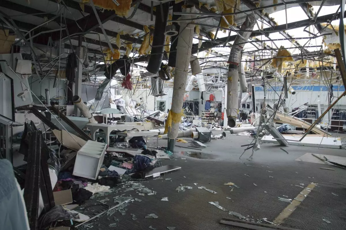 Damage to Maurices clothing is shown in Ada, Okla., after severe weather passed the area, Sunday, April 20, 2025. (Richard R. Barron/The ADA News via AP)