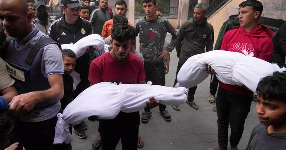 Israeli airstrike kills 10 people, half of them children, as mediators try to restart a ceasefire