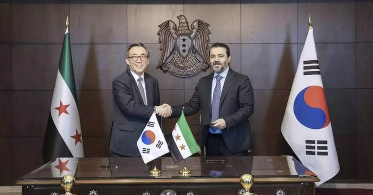 South Korea establishes diplomatic relations with Syria, a longtime friend of rival North Korea