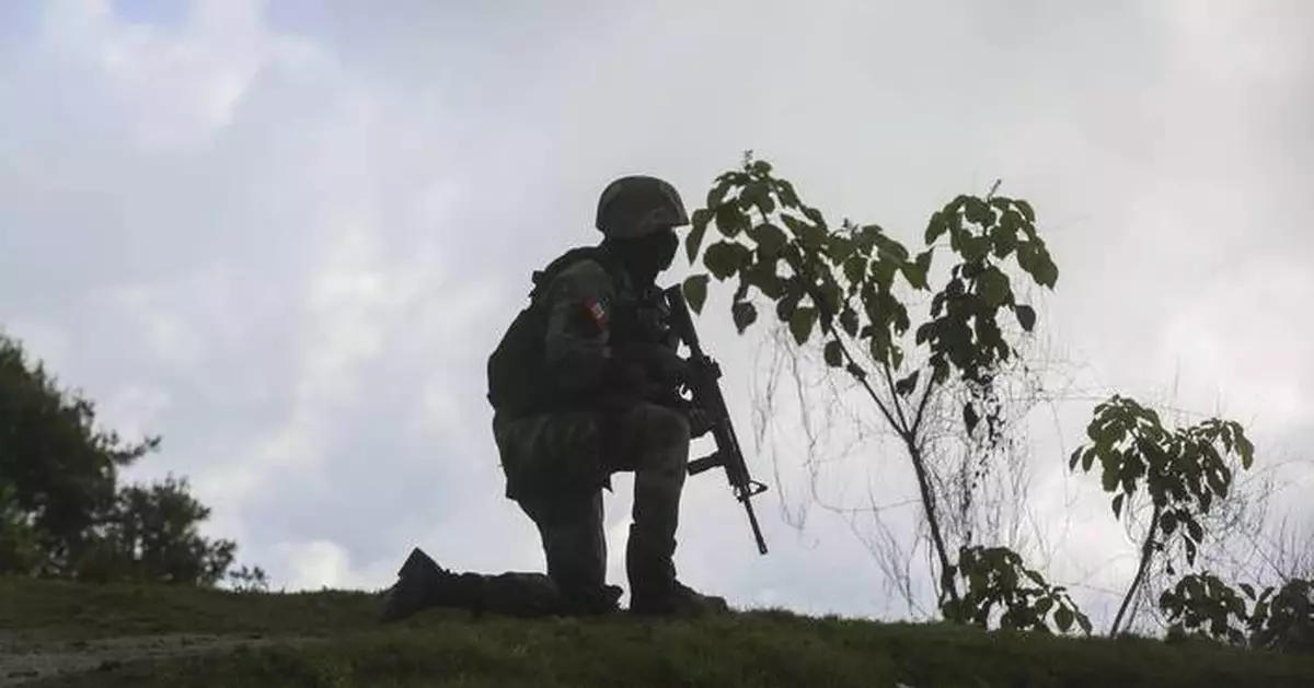 3 Haitian soldiers warring with gangs are slain outside of Port-au-Prince