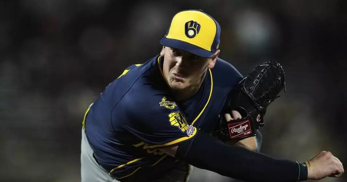 Brewers call up reliever Craig Yoho and the right-hander makes his major league debut