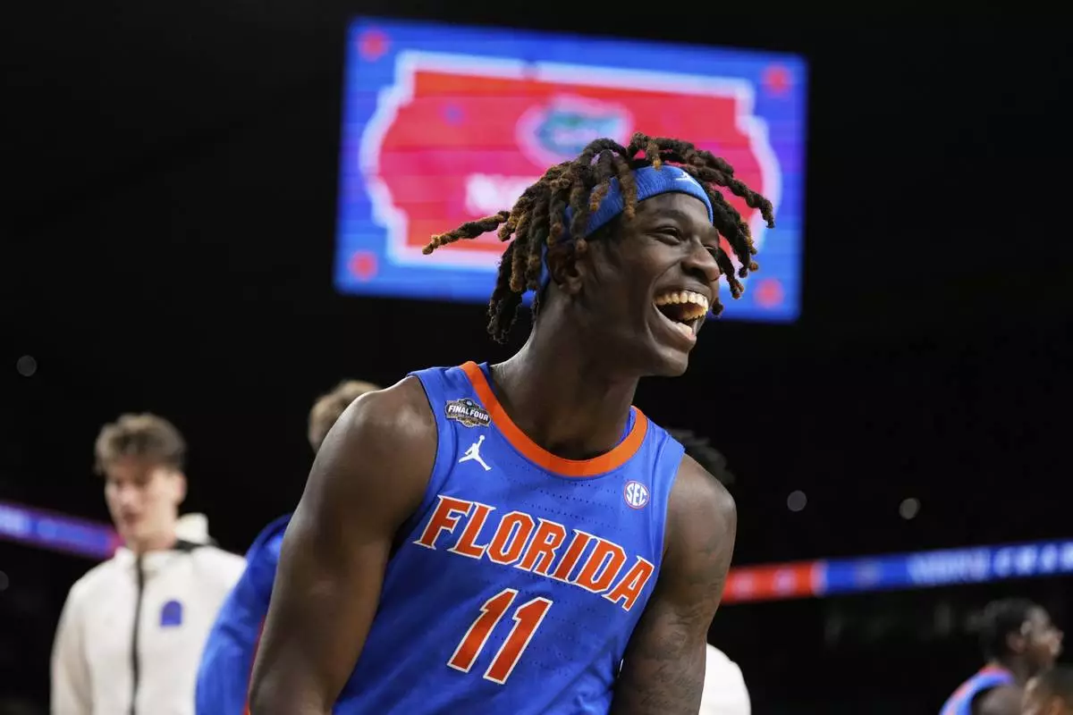Florida guard Denzel Aberdeen celebrates after after their win against the Houston in the national championship at the Final Four of the NCAA college basketball tournament, Monday, April 7, 2025, in San Antonio. (AP Photo/Brynn Anderson)