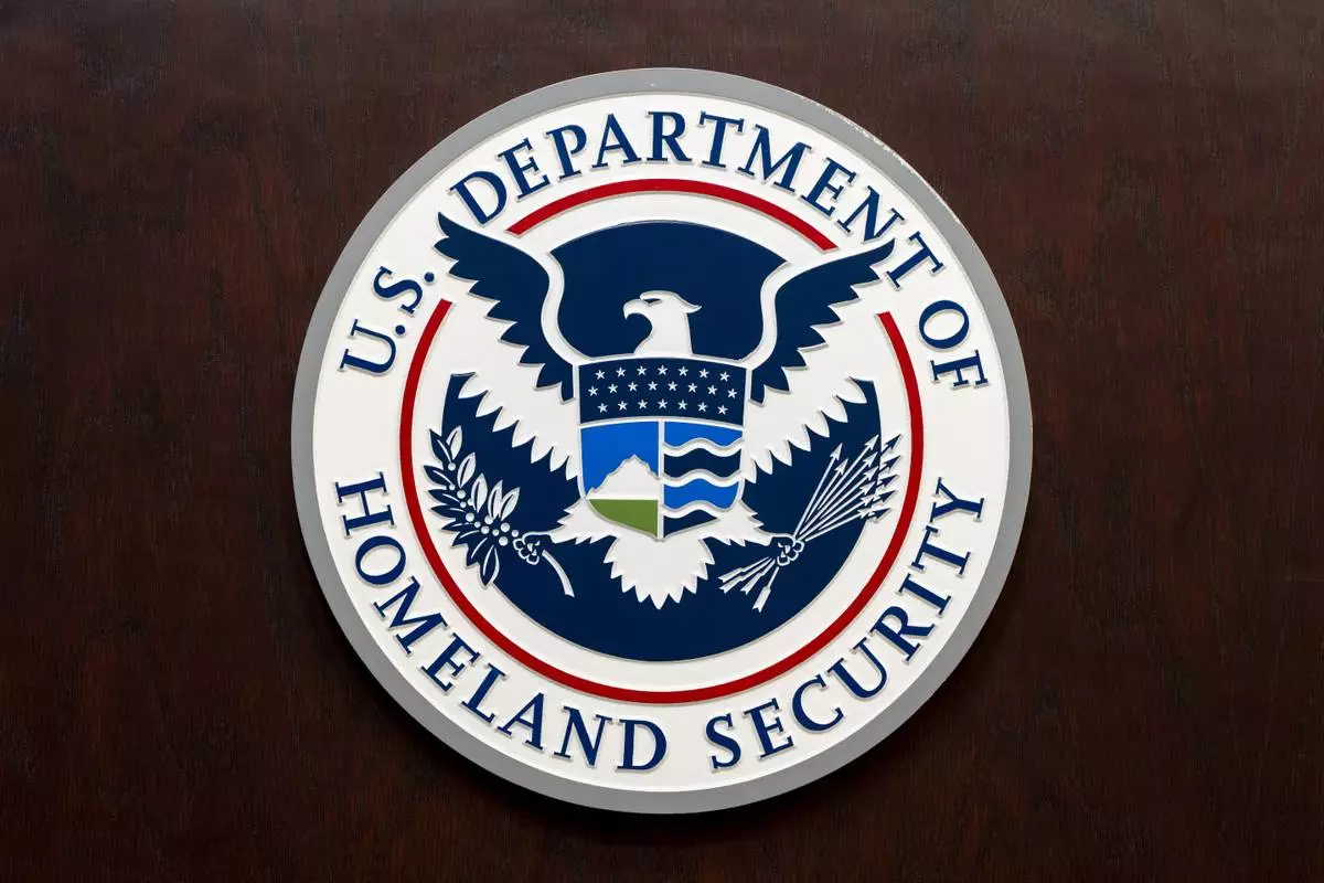 The Department of Homeland Security seal is seen on the podium at the Immigration and Customs Enforcement headquarters, Wednesday, April 9, 2025, in Washington. (AP Photo/Alex Brandon)