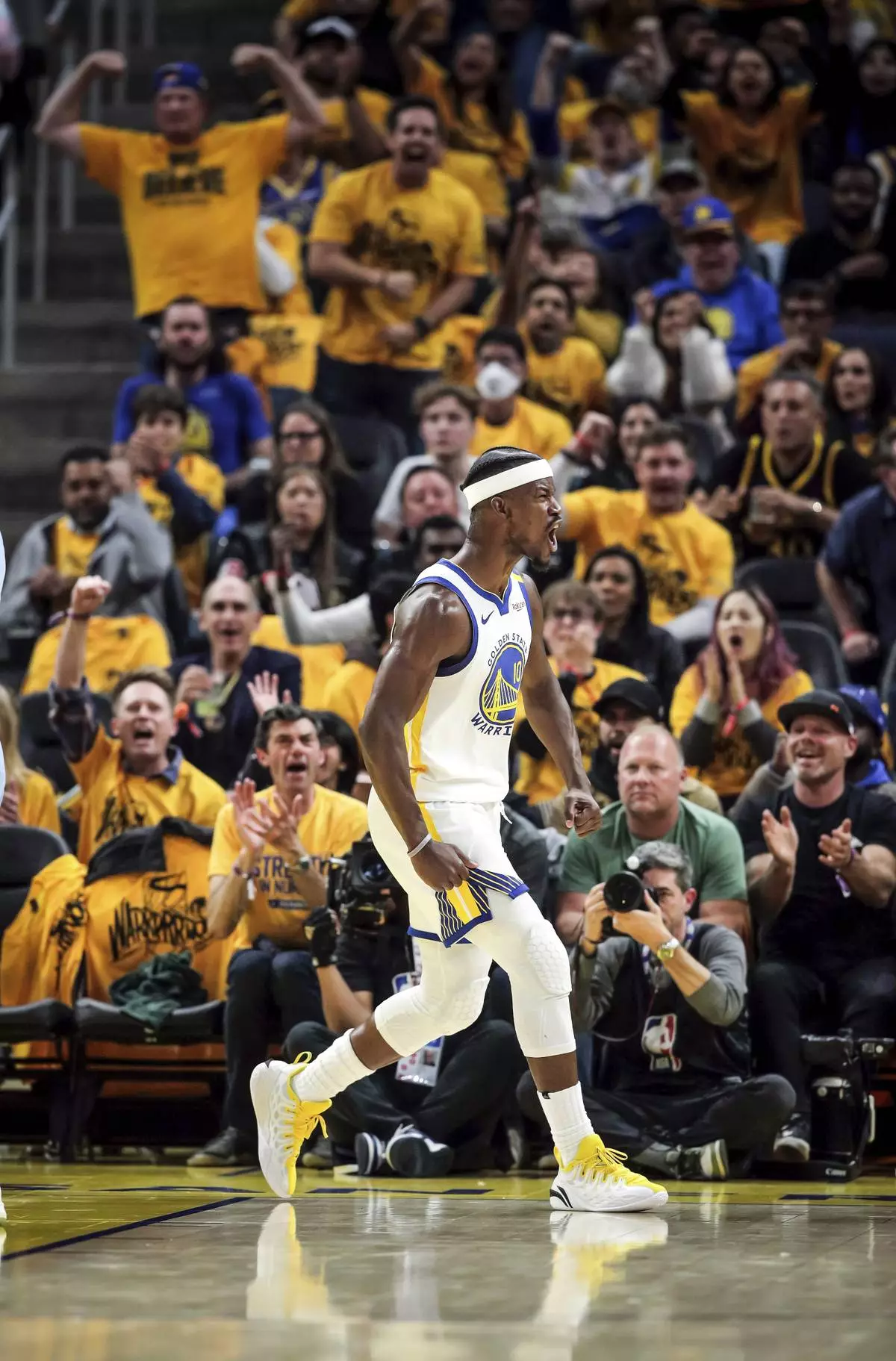 Golden State Warriors' Jimmy Butler III (10) celebrates a made basket and foul against the Memphis Grizzlies during the the first half of an NBA play-in tournament basketball game in San Francisco, Tuesday, April 15, 2025. (Carlos Avila Gonzalez/San Francisco Chronicle via AP)