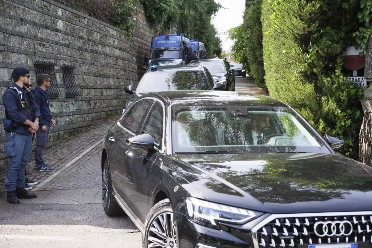Iranian delegates leave the Omani Embassy in Rome after closed-door meeting with a U.S. delegation to discuss Tehran's rapidly advancing nuclear program, Saturday, April 19, 2025. (AP Photo/Andrew Medichini)
