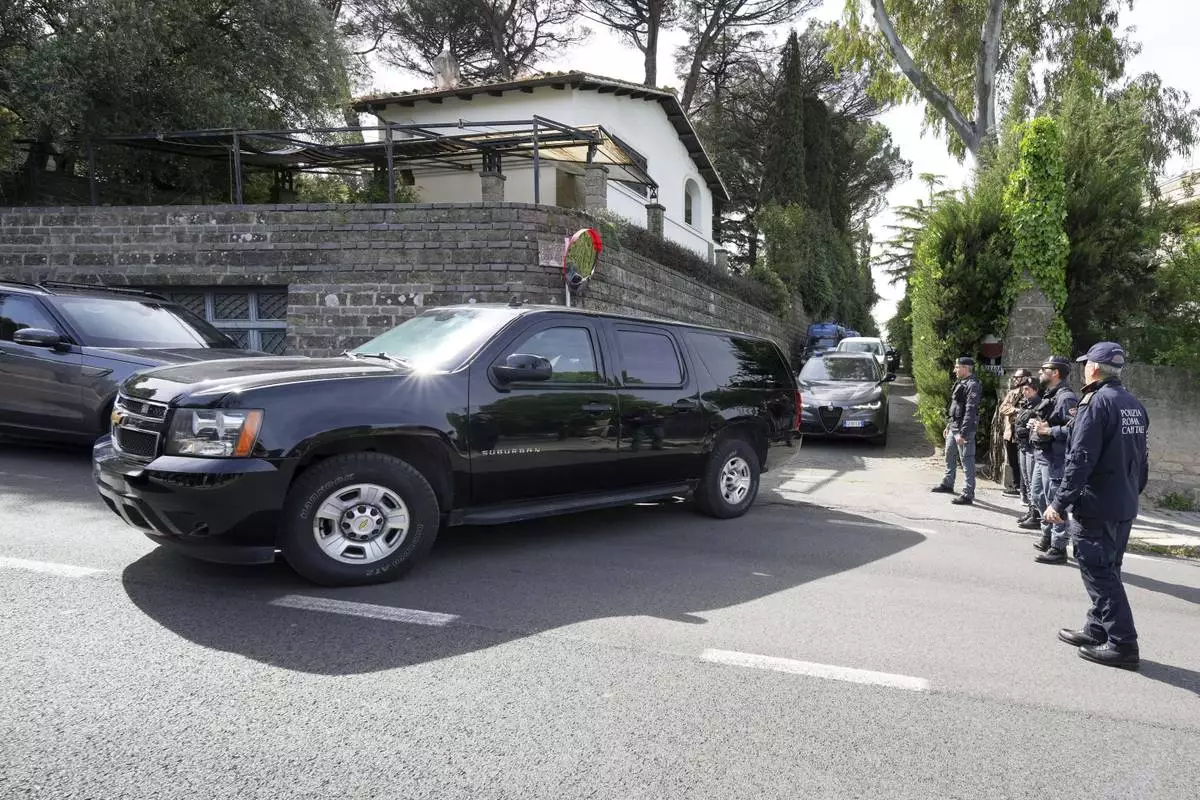 U.S. delegates leave the Omani Embassy in Rome after closed-door meeting with an Iranian delegation to discuss Tehran's rapidly advancing nuclear program, Saturday, April 19, 2025. (AP Photo/Andrew Medichini)