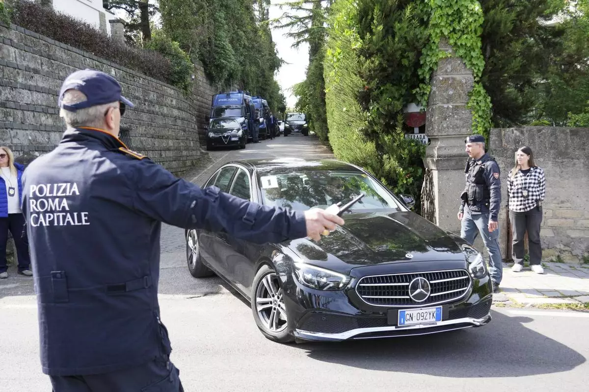 Iranian delegates leave the Omani Embassy in Rome after closed-door meeting with a U.S. delegation to discuss Tehran's rapidly advancing nuclear program, Saturday, April 19, 2025. (AP Photo/Andrew Medichini)