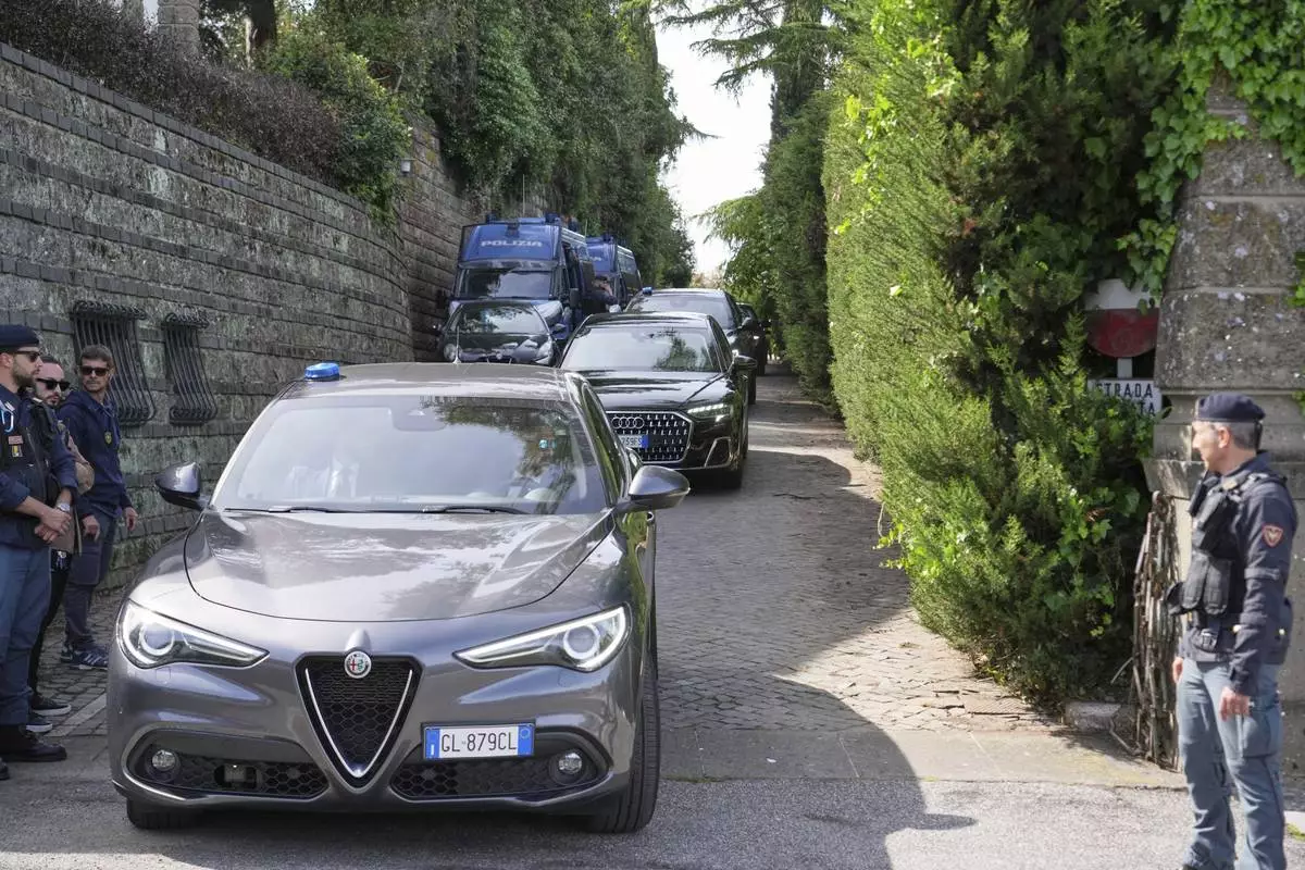 Iranian delegates leave the Omani Embassy in Rome after closed-door meeting with a U.S. delegation to discuss Tehran's rapidly advancing nuclear program, Saturday, April 19, 2025. (AP Photo/Andrew Medichini)