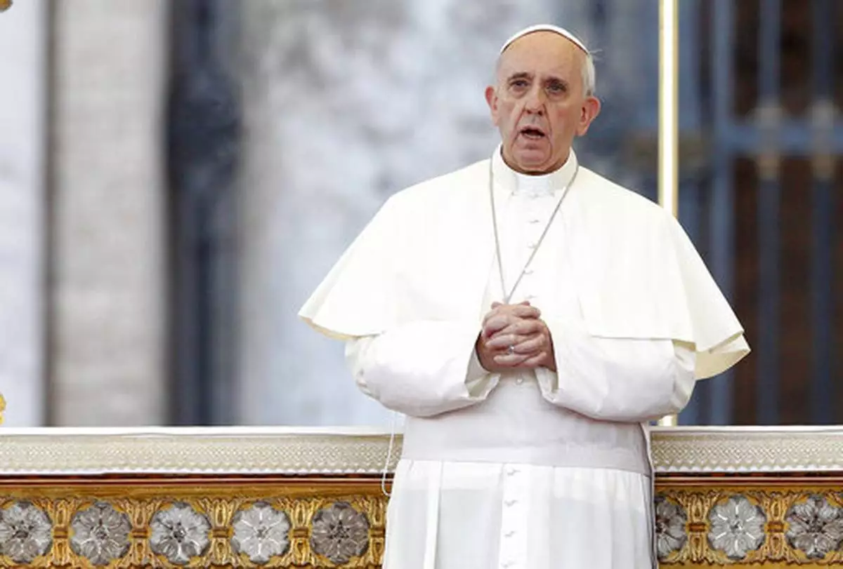 FILE - Pope Francis attends a vigil prayer for peace in Syria, in St. Peter's Square at the Vatican, Saturday, Sept. 7, 2013. (AP Photo/Riccardo De Luca, file)